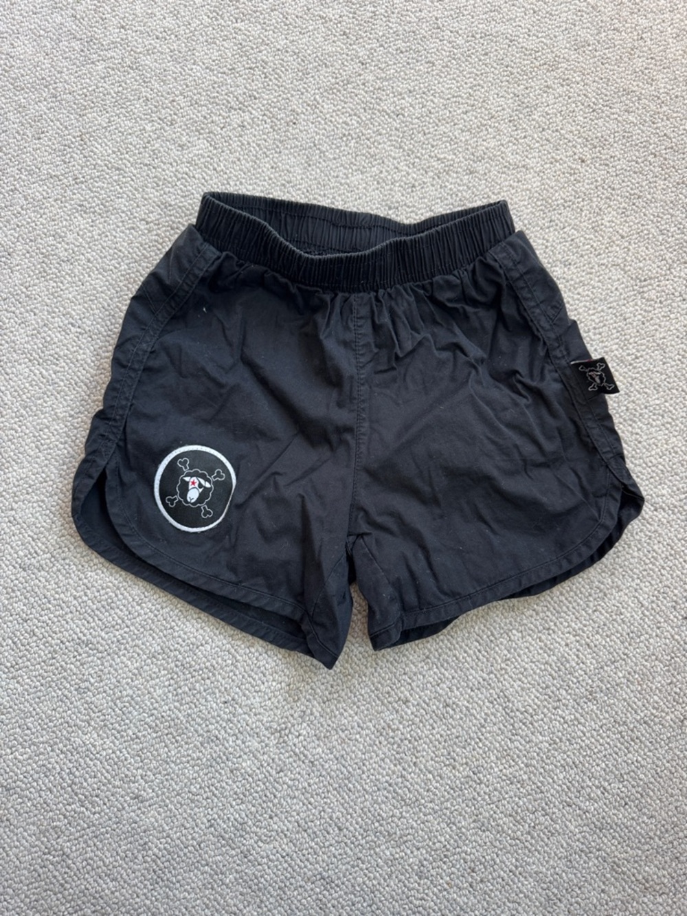 nununu Black Swim Shorts with Skull Patch